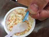 Tiny plastic strick inside coleslaw